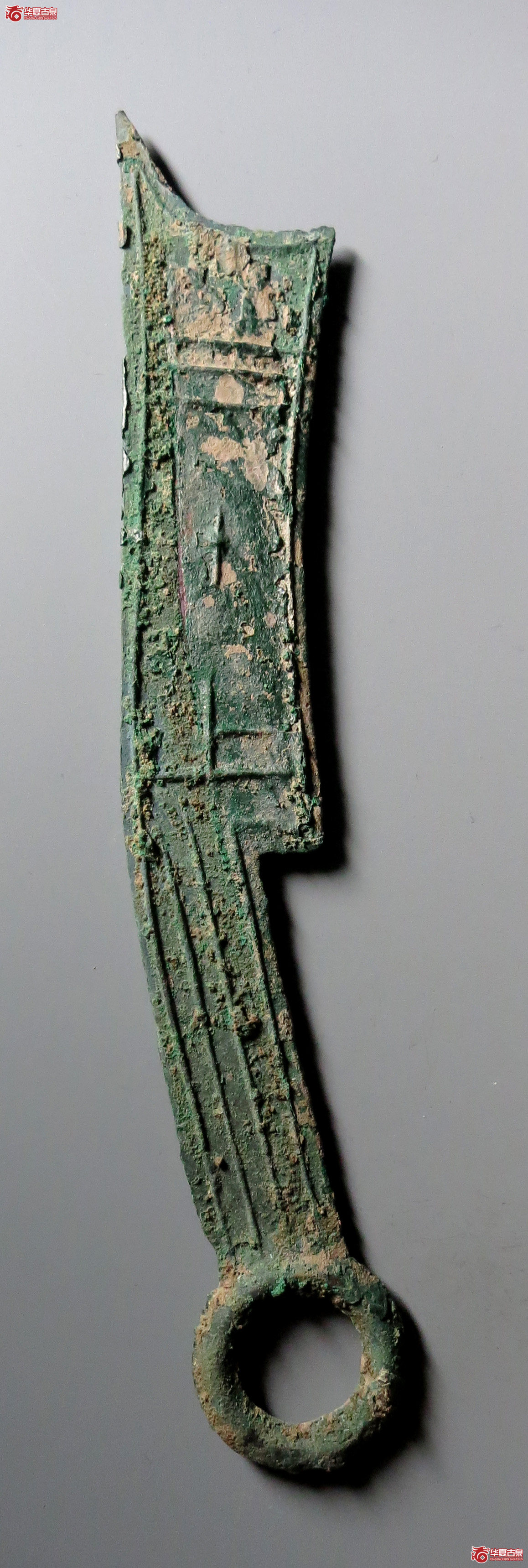 三字刀.齐法化背上